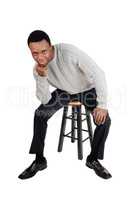 African man sitting on chair and thinking