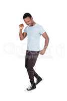 Young African man dancing by himself