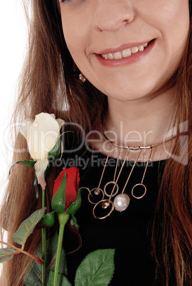 Close up of the necklace and mouth of woman