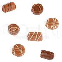 Assortment of chocolate candies isolated on white background.