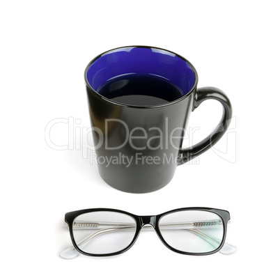 Cup with coffee and glasses isolated on white background.