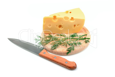 Cheese on a kitchen board isolated on white background.