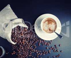 Coffee cup and beans