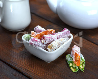 Turkish delight with nuts in a ceramic bowl
