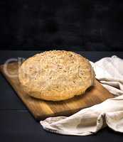 round bread from rye flour with sunflower seeds