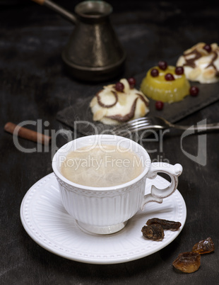 White ceramic cup with black coffee