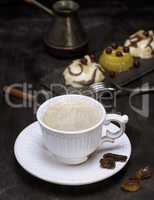 White ceramic cup with black coffee