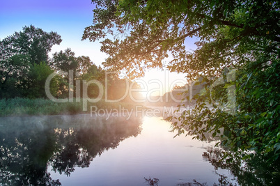 Morning fog on calm river