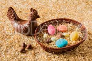Easter chocolate eggs over the straw