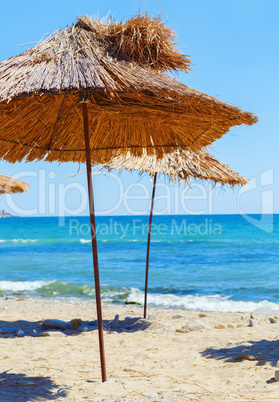 Straw beach umbrellas