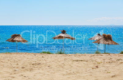 Thatched beach umbrellas