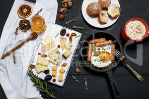 fried egg with sausages and cheese board