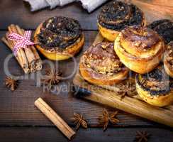 sweet round buns with cinnamon and poppy seeds   close up