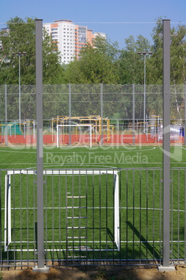 football field near fence at day sunny day