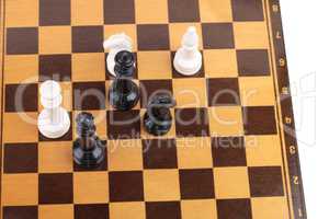 wooden checkerboard with figures