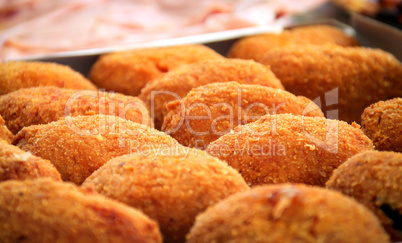 close-up view of a group of fried rice balls
