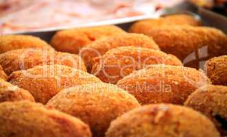 close-up view of a group of fried rice balls