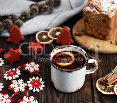 mulled wine with a white metal mug