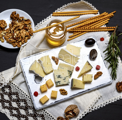 small pieces of brie cheese, roquefort, camember