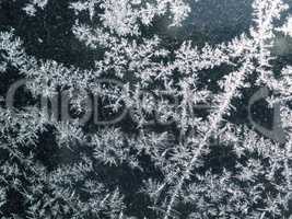 Close up of a window with frost pattern
