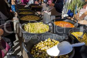 Green olive on the market in the street in town Palamos