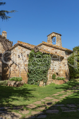 Beautiful old stone chapel in Spanish ancient village, Pals, in Costa Brava