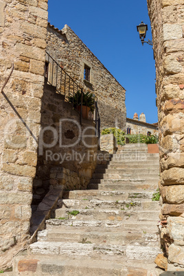 Beautiful old stone stairs in Spanish ancient village, Pals, in Costa Brava