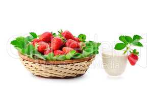 Strawberries in basket and milk smoothies isolated on white back