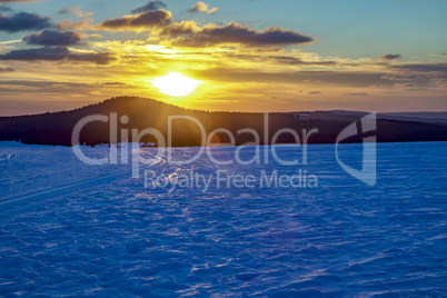 Snow landscape with sunset