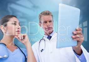 Doctor's holding tablet