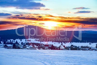 Snow landscape with sunset
