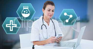 Female doctor using phone with medical interface hexagon icons