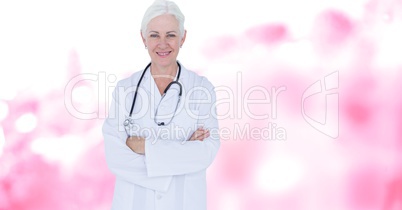 Female doctor folding arms