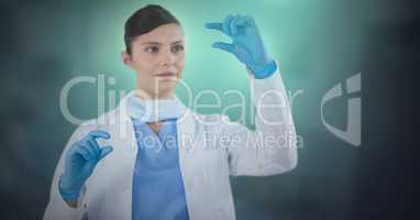 Female doctor interacting with air touch