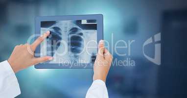 Doctor holding tablet