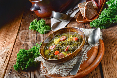 rustic kale soup with meat and sausage