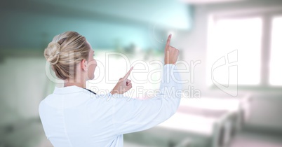 Female doctor interacting with air touch