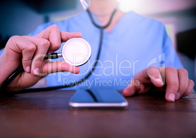 Doctor holding stethoscope