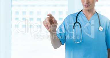 Male doctor interacting with air touch