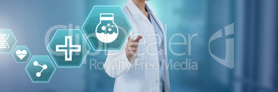 Female doctor interacting with medical hexagon interface