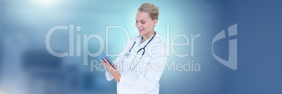 Female doctor holding tablet