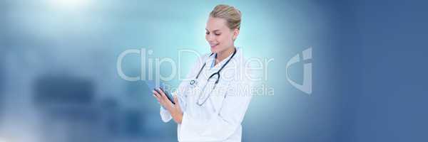 Female doctor holding tablet