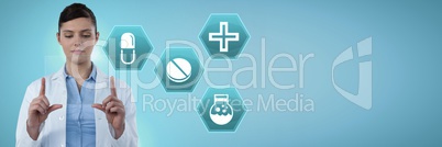 Female doctor holding tablet with medicine drugs interface hexagon icons