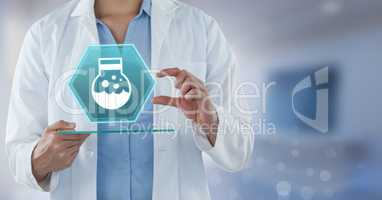 Doctor holding tablet with medicine interface hexagon icon