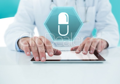 Male doctor holding tablet with medicine tablet drug interface hexagon icon