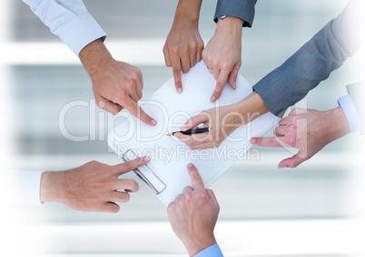 Teamwork transition with business peopleworking and pointing at document