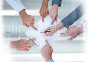 Teamwork transition with business peopleworking and pointing at document