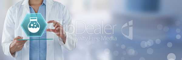 Doctor holding tablet with medicine interface hexagon icon