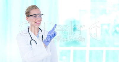 Female doctor interacting with air touch