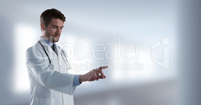 Male doctor interacting with air touch